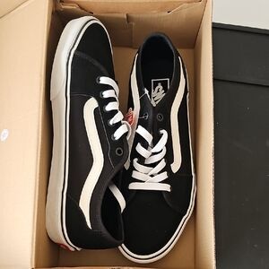 Vans Men's Black and White Sneakers